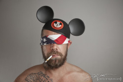 diablodivine:  Jake Deckard #jakedeckard #mickeymouse #mickeyears #disney #WaltDisneyWorld #ears #hat #america #americanflag #bandana #smoking #cigarette #tattoo 