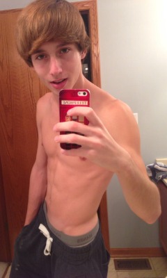 dominantwink:  sweetncutes:  waistbandboy:  I LOVE iPhones!   He looks like my BF  I want to pull him over my knee and spank his ass red for wearing Hanes underwear. 
