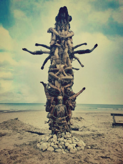 obsessedwithskulls:  A totem pole of corpses