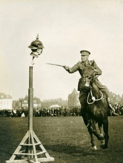 Kaiser’s head, 1930. 104th brigade R.F.A Sports at Folkestone. Colonel E.A.P. Hobhay, commanding the brigade winning the officers “Kaiser’s” head and ring “competition”.