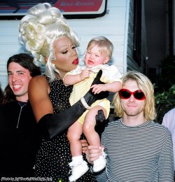 retropopcult:Dave Grohl, RuPaul (trying to console an unhappy Frances Bean) and Kurt Cobain, 1993