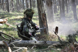 militaryarmament:  Swedish Soldier laying down heavy suppressive fire with his KSP 58 (FN MAG) during a field training exercise - 2012.