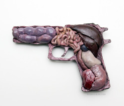 yasboogie:   Anatomy of War: Smith &amp; Wesson (8.5 x 5.75 x 1.5 in.) Polymer clay, acrylic, enamel It’s impossible to separate the violence of the ongoing wars around the globe from the weapons that fuel them. Specifically the countless numbers of