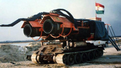 enrique262:  The Hungarian Big Wind firefighting vehicle, a T-34 chassis equipped with two MiG-21 engines, designed to extinguish oil and gas well fires by blasting a constant mist of water to the base of the fire, where the water is injected behind