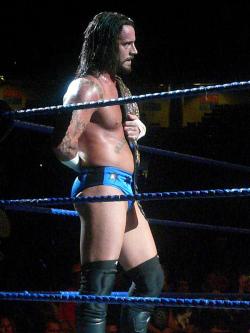 breakyoursoulapart:  stephluvzrasslin:  CM Punk, I don’t even like long hair but something about this picture is sexy.   I don’t remember those trunks.VERY sexy!