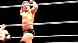 Chris Jericho flexing (X)