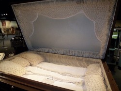 congenitaldisease:  This three-person suicide coffin is located in the National Museum of Funeral History, Houston. The story behind this custom made coffin is that a couple’s infant daughter passed away and the couple agreed to commit suicide to be