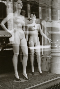 Two female mannequins stand undressed in a windowshop front in the 1940s. Photographed by John. Department Store Models, Chicago, Illinois by John Vachon