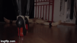 Brutal goddess teasing her foot slave and leaving him without release.