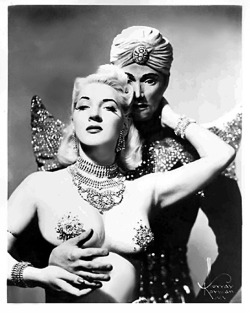  Gene Gemay    (and her Genie) She performed a popular routine themed around the &ldquo;Arabian Nights&rdquo; mythology.. Ms. Gemay would dance in a harem outfit &amp; rub a large Aladdin’s Lamp onstage, from which a rubber mannequin “Genie”
