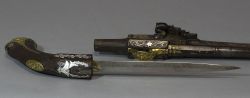 art-of-swords:  Pistol Dagger Dated: circa 1850 Culture: British (manufactured for the Orient) The weapon has round faceted barrels with lugs, gilt engraved and decorated, and marked ‘London’. The swan neck plate and hammer have a flat body, while