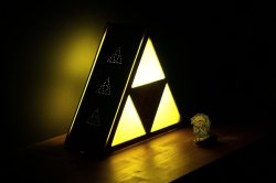insanelygaming:  The Legend of Zelda Triforce Lamp  Created by Eric Margera Learn how to build your own on his DeviantArt page!