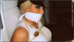 superbounduniverse:  superbounduniverse:  Brooke as a cop bound and gagged in the back of a van. Courtesy of Superbound.  Brooke Haven in Nosy Cop Nabbed