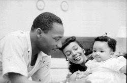 twixnmix:  Martin Luther King Jr. at home with his wife Coretta Scott   King  and their daughter Yolanda   King    in Montgomery, Alabama. May 1956.  