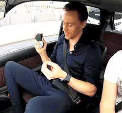 haveahiddles:  lokihiddleston: His legs. His damn legs.  He even sits like a whore IN THE CAR. HOW? WHY? THE DASHBOARD IS NOWHERE NEAR YOUR PRECIOUS KNEES. Jesus Christ on a cracker… this man will kill me someday. 
