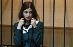 masaakimonster:  “Nadezhda Tolokonnikova looks out from a holding cell during this morning’s appeal hearing in Zubova Polyana.” 