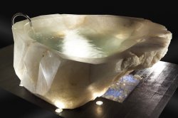 sixpenceee:  Bathtub cut from a single piece of quartz crystal.  