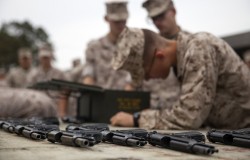 militaryarmament:  Marines with II Marine Expeditionary Force firing their M9 service pistol during a pistol qualification course aboard Camp Lejeune, N.C., April 7, 2015.
