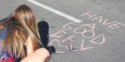 her-hair-is-always-a-mess:  my friend writing in a parking space 