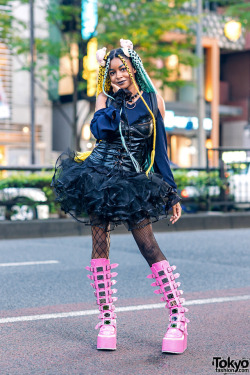 tokyo-fashion:  Tokyo college student Sierra on the street in Harajuku wearing a tulle skirt and corset top from ACDC Rag, Dolls Kill accessories, a coach backpack, and tall pink Demonia buckle platform boots. Full Look