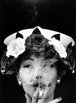 Dailyartspace:  Art Of The Day Hat And 5 Roses, Paris (Vogue) By William Klein 