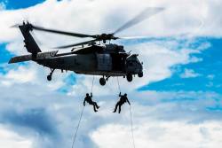 fuckyeahusnavy:  Hanging in There U.S. Navy sailors rappel onto the flight deck of the aircraft carrier USS George Washington during a helicopter rope exercise in the Philippine Sea, Sept. 9, 2014. The George Washington and its embarked air wing, Carrier