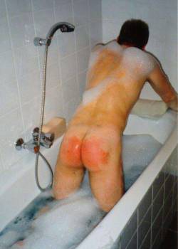 b-w-b-b:Being bathed by his father after his spanking. Afterwards he will be sent to an early bedtime with no supper.