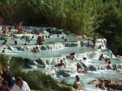 sixpenceee:  Cascate del Mulino, Saturnia, Tuscany, ItalySteaming hot spring water comes out of the ground at 37.5 C and cascades over a series of small waterfalls into dozens of pools on consecutive levels. (Source)