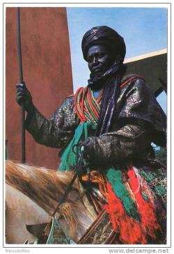 nigerianostalgia:  A mounted Hausa warrior in full ceremonial regalia, Nigeria 1974Vintage Nigeria  Warrior