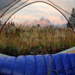 nativeyewear:  Sunrise lighting up Grand Teton! Even though we technically “camp out” every night, sometimes it’s necessary to get out of the van and spend a night under the stars. This place is pure magic! #nativesknow (at Grand Tetons National