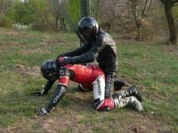 britishbootedbastard:  Leather clad bikers rebore with leather fuck and MX boot brawl. Eat Leather lads.  Woof woof