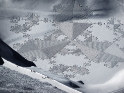 crossconnectmag:  Magnificent Geometric Snow Art by Simon BeckFor the past decade,   Simon Beck    has been decorating the mountains with his stunning mathematical drawings, created by running in snowshoes across the freshly laid snow. Each image takes