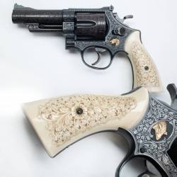 georgebeast:  Engraved Smith &amp; Wesson This engraved Smith &amp; Wesson Model 29 revolver must have been made up for a hog hunter who wanted a short, easily carried backup sidearm going after big pig in the brush. The golden inlays on either side of