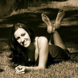 Thanks to BrandiWilliams from mygirlfund for sharing this sexy black and white shot showing off her bare feet and beautiful smile