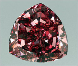sixpenceee:  Red Diamonds  Red is the rarest diamond color and the most expensive diamond color.  Red shades are thought to be due to changes to the electron structure during the diamond’s voyage to the surface.  (Source)
