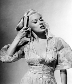 timeofbeauty:  Loomis Dean - Mamie Van Doren brushing her hair in anger during acting exercise as she portrays a great star who has learned that her lover &amp; leading man is cheating on her, at Universal International’s talent school. 