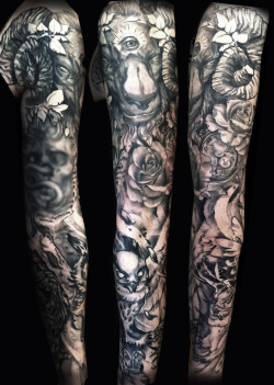 fuckyeahtattoos:  Healed sleeve done, 60% freehand work, skull not done by me. @BLuecardinalart