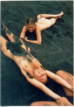 exposingyourselfinthedark:  Naked hippies playing on black sand