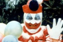 sixpenceee:  You may never have heard of Pogo the Clown, pictured above, but when the paint comes off he was better known as John Wayne Gacy, serial killer and rapist in the 1970s. When he wasn’t appearing as a clown at children’s birthday parties,