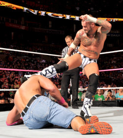 fishbulbsuplex:  C.M. Punk vs. John Cena  Those Jorts can&rsquo;t even contain Cena&rsquo;s huge ass!!!