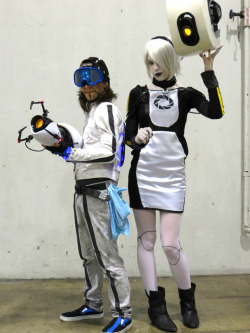 strawberrieninja:  StrawNin as GLaDOS, Thomasu as Wheatley! GLaDOS-head’s eye looks coy at this angle @w@ (I’m in love with my own costume, hahaha what’s wrong with me)