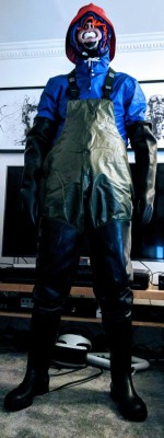 smokefish2:  fishermanfaggot: 3 layers of Grundens and 66 North fisherman rainwear, waders, shoulder length rubber gaskets, open face rubber hood, posture collar, nose hook, mouth guards and cheek spreaders. it was impossible to do anything but sweat