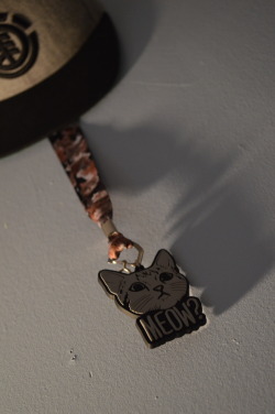 theaznnoodlez:  I just needed the little plastic slip thingy. So if ya want a new lanyard come find me. It has a bunch of cats and shit on it.   ooooo i want it&hellip;.