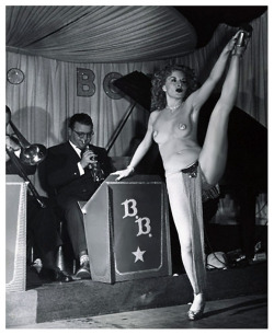 burleskateer:  In a vintage 50’s-era photo,– Pat “Amber” Halladay displays a leg kick during a performance at an unidentified nightclub.. 