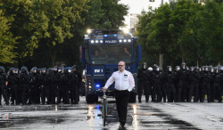cakeandrevolution: queeranarchism:   60 year old historian Martin Bühler (who identified himself to the press, I do not identify activists without consent) appears to ‘photobomb’ a lot of media images of the G20 in Hamburg. In reality he is a long