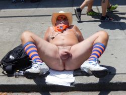 Naked Exhibitionist at Dore Alley.Â  Mr Smiles showing his naked crotch in the fun spread eagle naked in public shot.