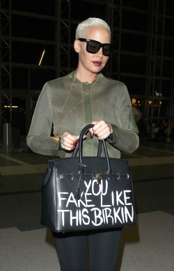 discoveritall:  daily–celebs:    4/21/15 - Amber Rose at LAX Airport.   