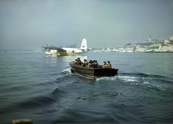 warisstupid:  Off on another sortie, early1945.. by Etiennedup on Flickr.The crew of Sunderland RB-D (no 10 RAAF Sqn.) in the duty pinnace on their way to their ‘ship’ in Plymouth harbour, the RAF station being known as Mount Batten.
