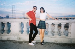 americanapparel:  Kyung and Ulysse date looks for Valentines’ Day by American Apparel. Product Links:Printed Rayon Short Sleeve Button-Up ShirtCotton Spandex Crop TeePlaid Tennis SkirtUnisex Tennis Shoes 