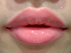 daddy-urges:  As I watch my daughter give her mother a kiss on the cheek and bounce out the door to school, I can’t help but be amazed at what a thin coat of lip gloss can cover up. My wife has no idea that only minutes before that mouth was stretched